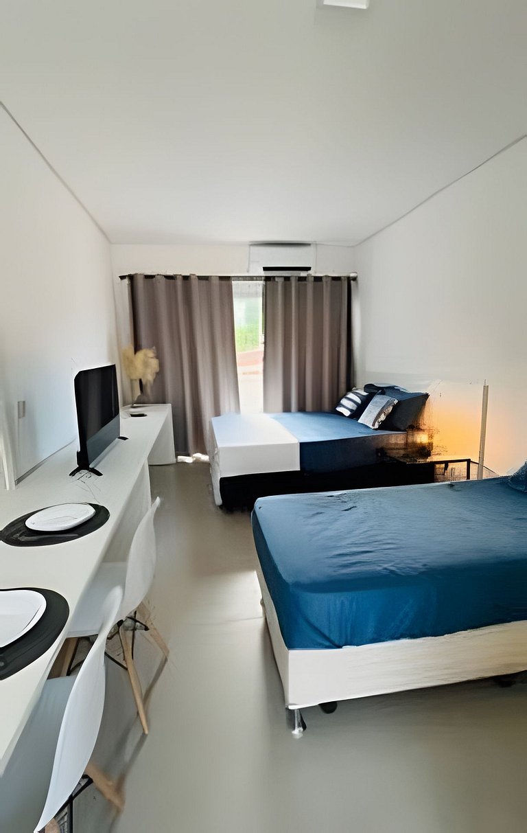 Studio para 3 pessoas com piscina no centro de Peruíbe