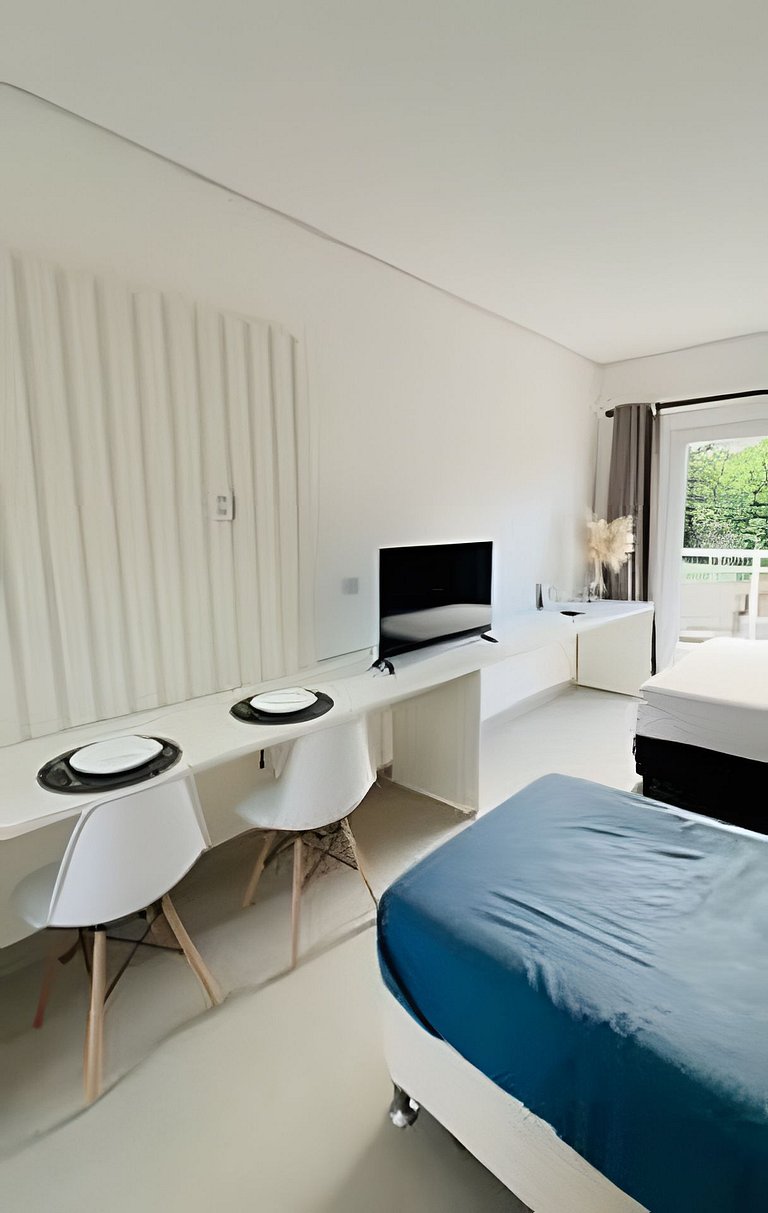 Studio para 3 pessoas com piscina no centro de Peruíbe